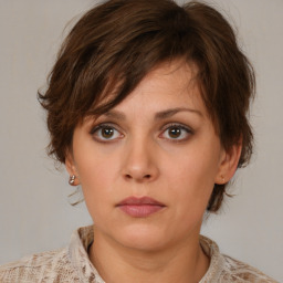 Neutral white young-adult female with medium  brown hair and brown eyes