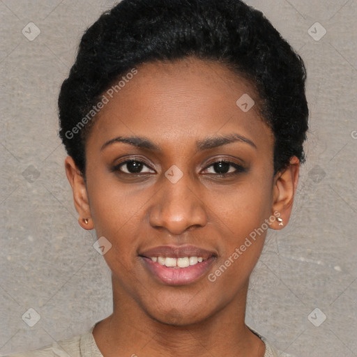 Joyful black young-adult female with short  black hair and brown eyes