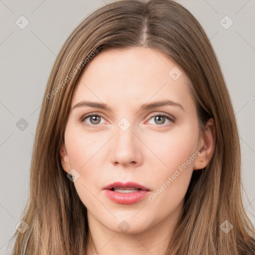 Neutral white young-adult female with long  brown hair and brown eyes