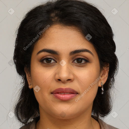 Joyful latino young-adult female with medium  brown hair and brown eyes