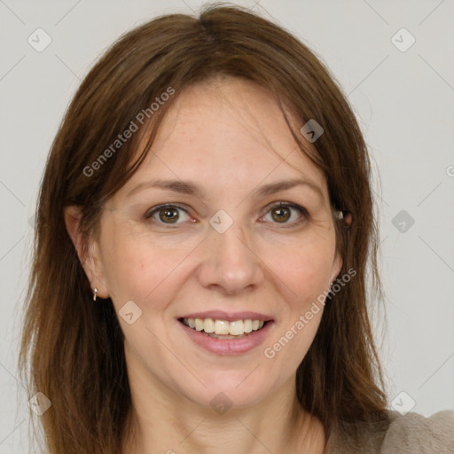 Joyful white adult female with medium  brown hair and grey eyes