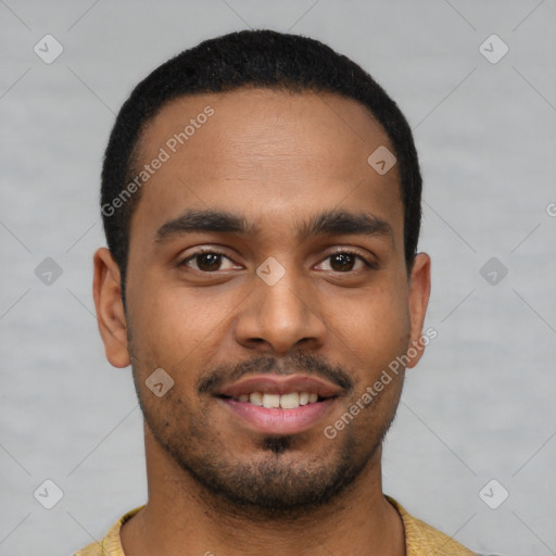 Joyful latino young-adult male with short  black hair and brown eyes