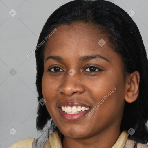 Joyful black young-adult female with medium  black hair and brown eyes