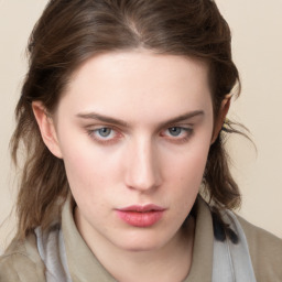 Neutral white young-adult female with medium  brown hair and blue eyes