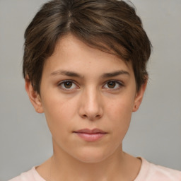 Neutral white young-adult female with short  brown hair and brown eyes