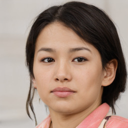 Neutral asian young-adult female with medium  brown hair and brown eyes