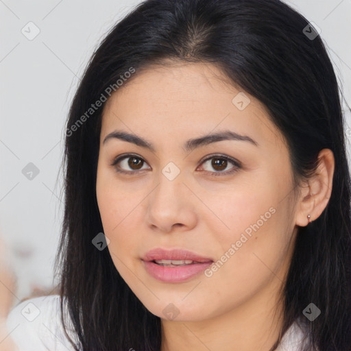 Joyful asian young-adult female with long  brown hair and brown eyes