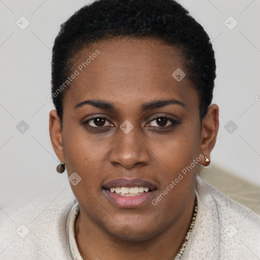 Joyful black young-adult female with short  brown hair and brown eyes