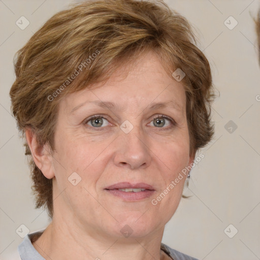 Joyful white adult female with medium  brown hair and grey eyes