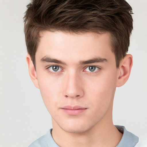 Neutral white young-adult male with short  brown hair and brown eyes