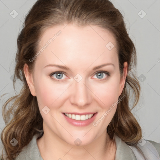 Joyful white young-adult female with medium  brown hair and blue eyes