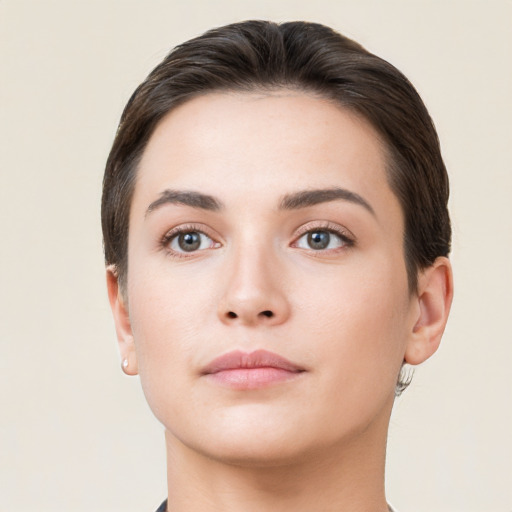 Neutral white young-adult female with short  brown hair and brown eyes