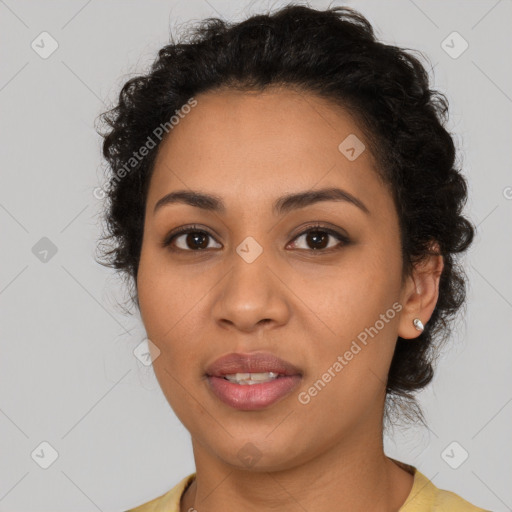 Joyful latino young-adult female with short  brown hair and brown eyes