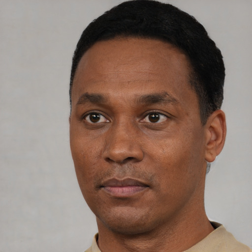 Neutral black young-adult male with short  black hair and brown eyes