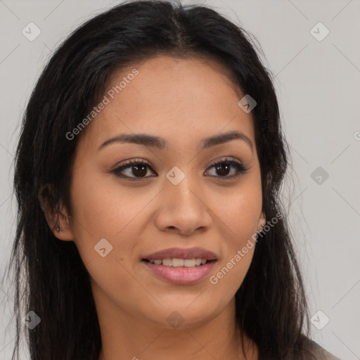 Joyful latino young-adult female with long  brown hair and brown eyes