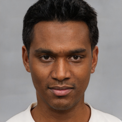 Neutral latino young-adult male with short  black hair and brown eyes