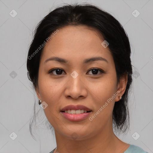 Joyful asian young-adult female with medium  brown hair and brown eyes