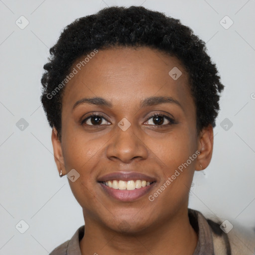 Joyful black young-adult female with short  brown hair and brown eyes