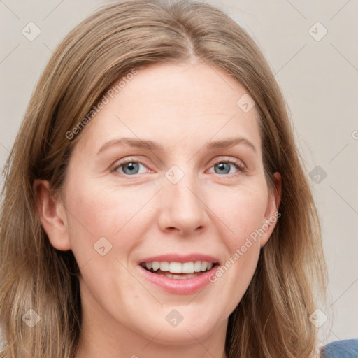 Joyful white young-adult female with medium  brown hair and blue eyes