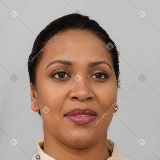 Joyful latino adult female with short  brown hair and brown eyes