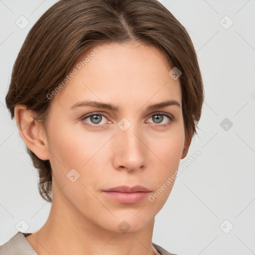 Neutral white young-adult female with short  brown hair and grey eyes