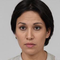 Neutral white adult female with short  brown hair and brown eyes