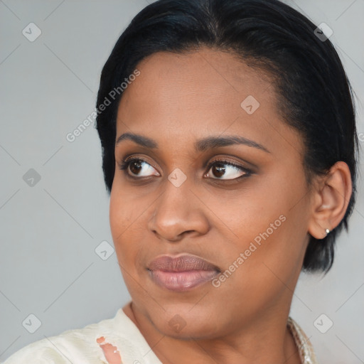Joyful asian young-adult female with medium  black hair and brown eyes
