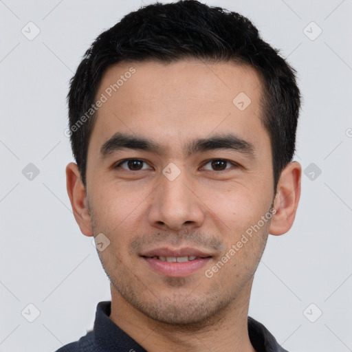 Joyful white young-adult male with short  black hair and brown eyes