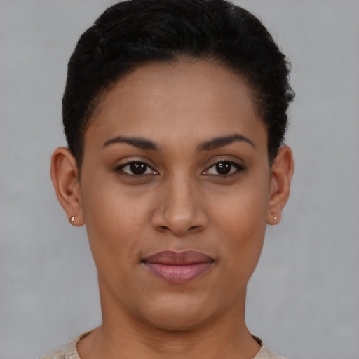 Joyful latino young-adult female with short  brown hair and brown eyes