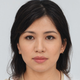 Neutral asian young-adult female with medium  brown hair and brown eyes