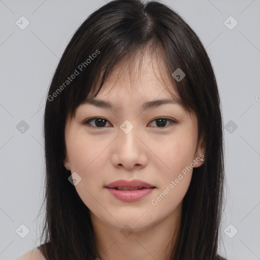 Joyful asian young-adult female with long  brown hair and brown eyes