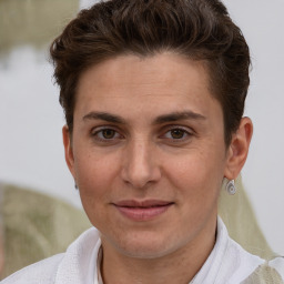 Joyful white adult female with short  brown hair and brown eyes