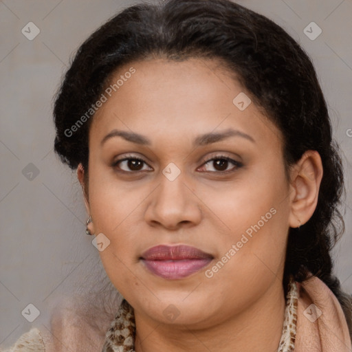 Joyful latino adult female with medium  brown hair and brown eyes