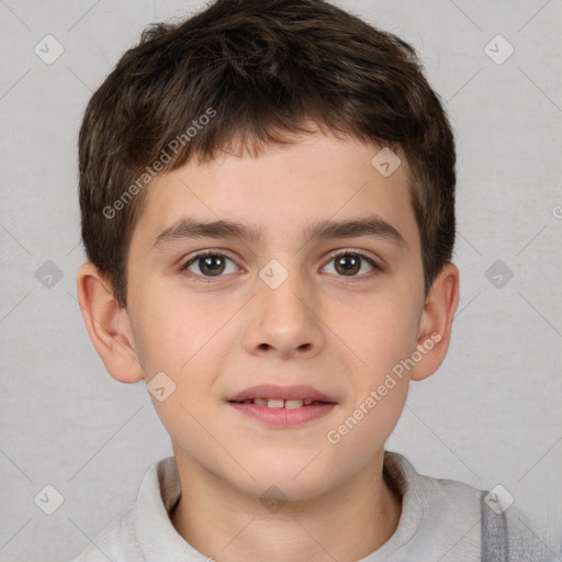 Joyful white child male with short  brown hair and brown eyes