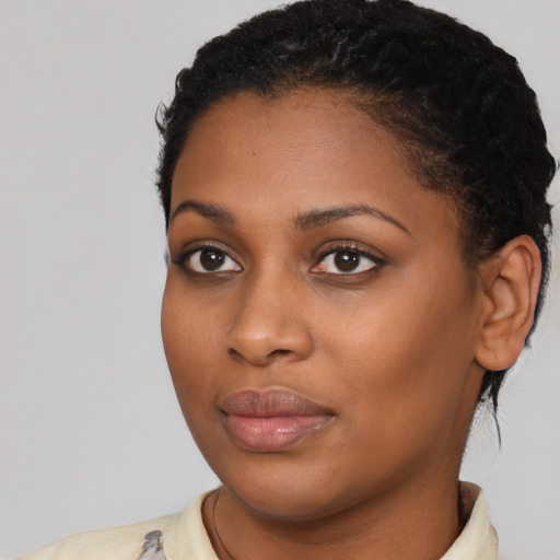 Neutral black young-adult female with short  brown hair and brown eyes