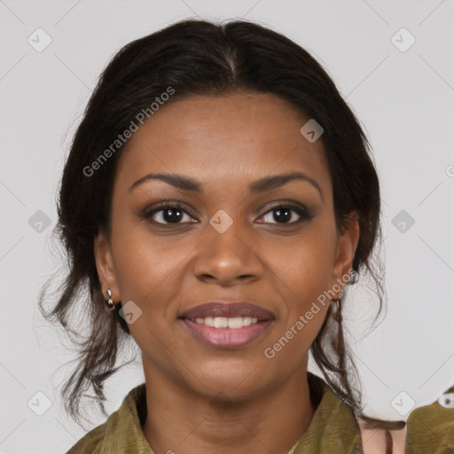 Joyful black young-adult female with long  brown hair and brown eyes