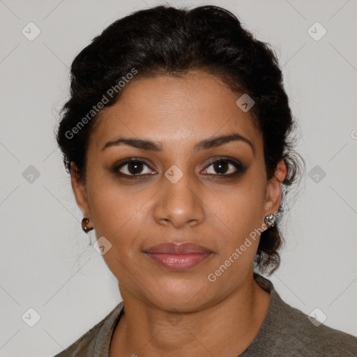 Joyful latino young-adult female with short  brown hair and brown eyes