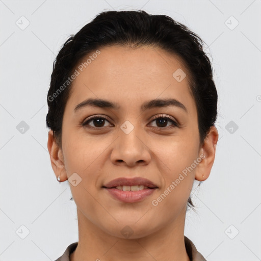 Joyful latino young-adult female with short  brown hair and brown eyes