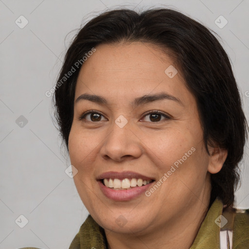 Joyful white adult female with medium  brown hair and brown eyes