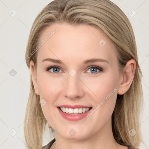 Joyful white young-adult female with long  brown hair and blue eyes