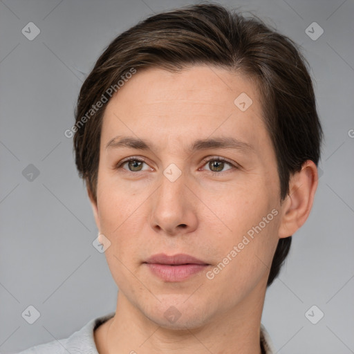 Joyful white adult female with short  brown hair and brown eyes