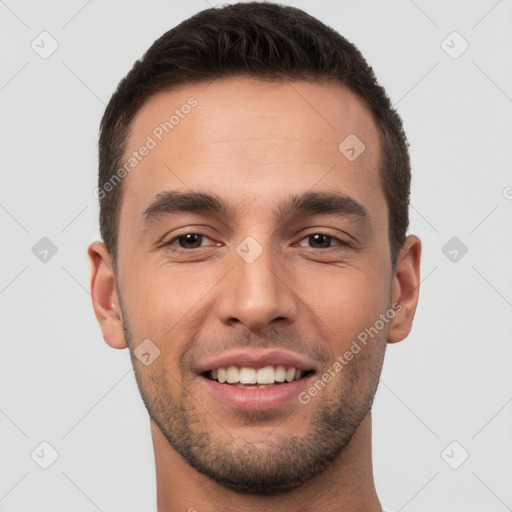 Joyful white young-adult male with short  brown hair and brown eyes