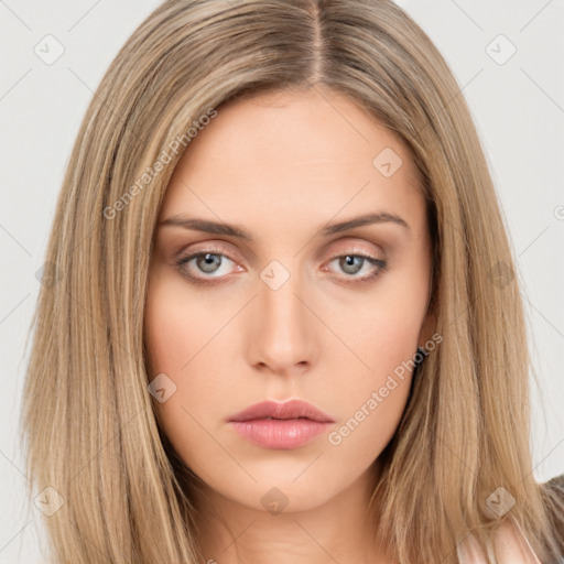 Neutral white young-adult female with long  brown hair and brown eyes