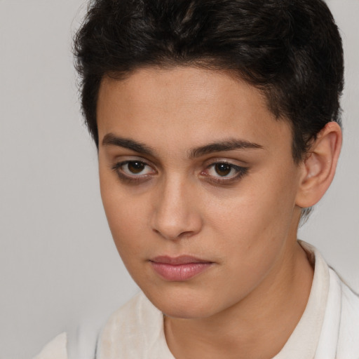Neutral white young-adult female with short  brown hair and brown eyes