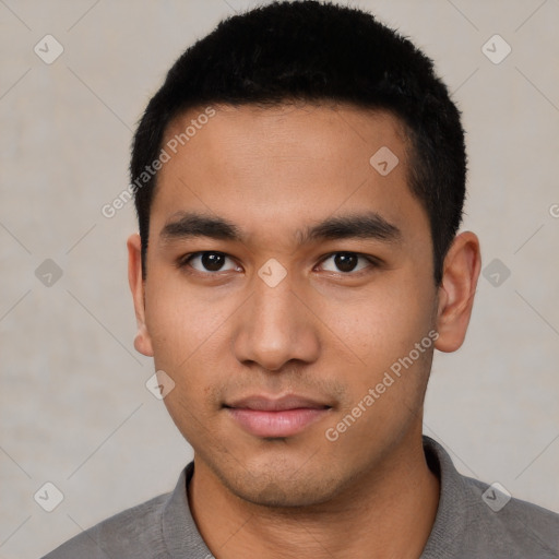 Neutral latino young-adult male with short  black hair and brown eyes