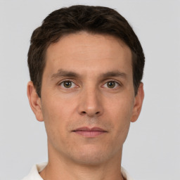 Neutral white adult male with short  brown hair and brown eyes