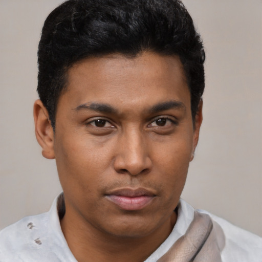 Neutral black young-adult male with short  brown hair and brown eyes
