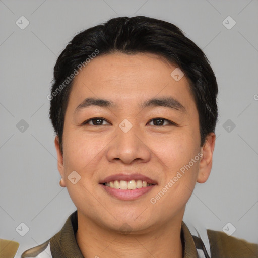 Joyful asian young-adult male with short  black hair and brown eyes