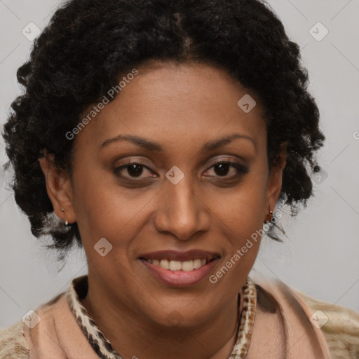 Joyful latino adult female with medium  brown hair and brown eyes