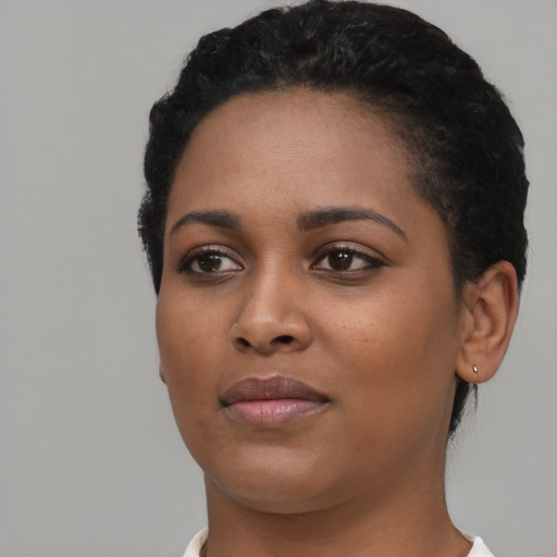 Neutral black young-adult female with short  black hair and brown eyes